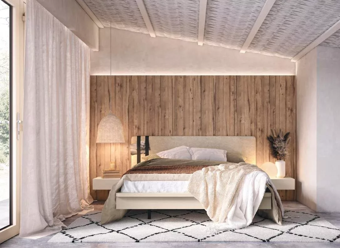 Dormitorio de matrimonio con cabecero de madera y tonos naturales